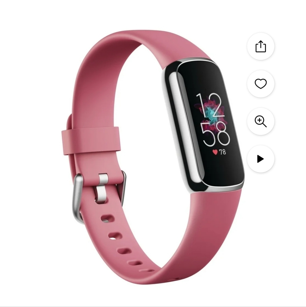 Fitbit Lux Pink Smartwatch with Sleek Design and Color Display